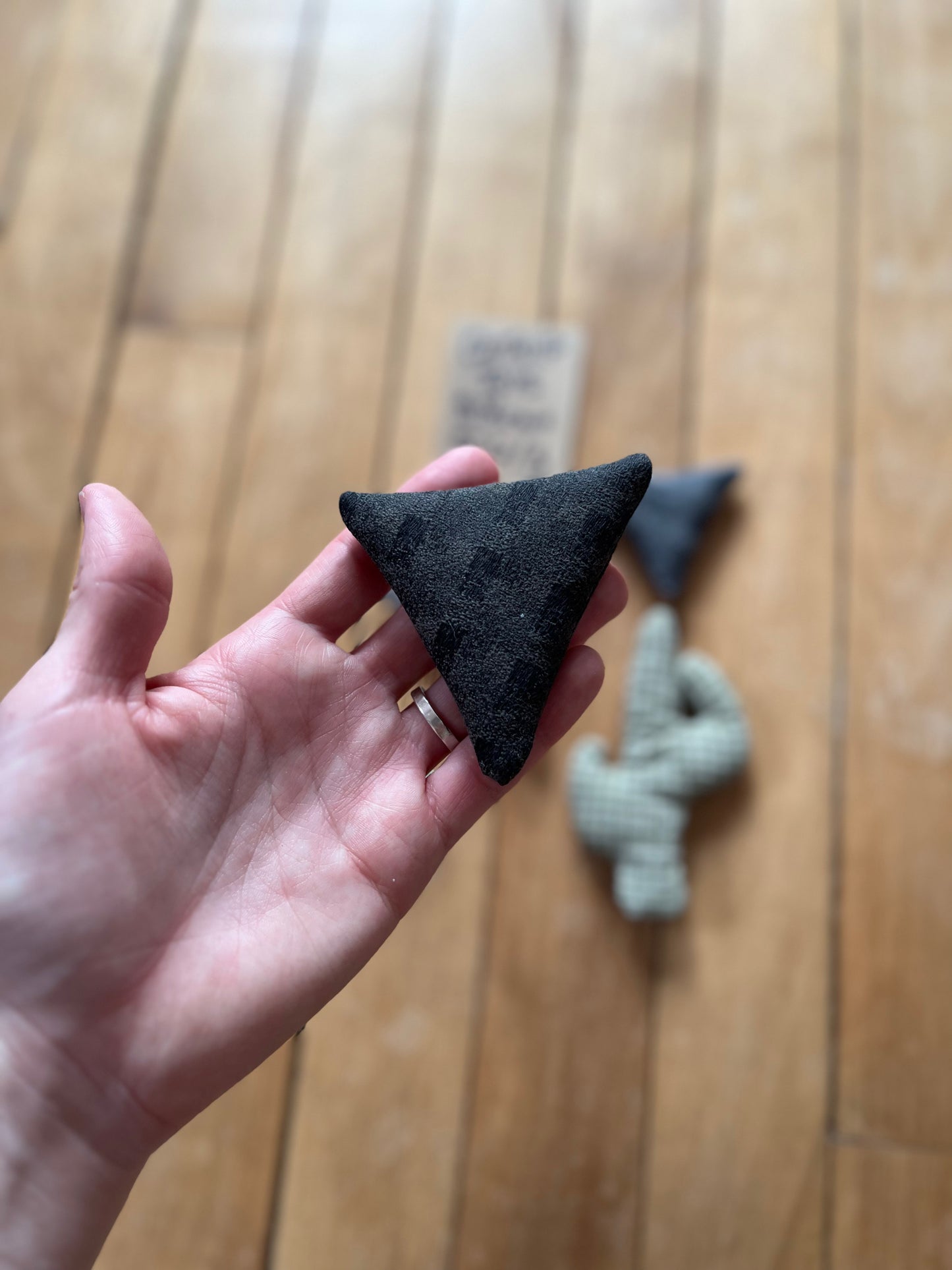 black checkered triangle catnip toy