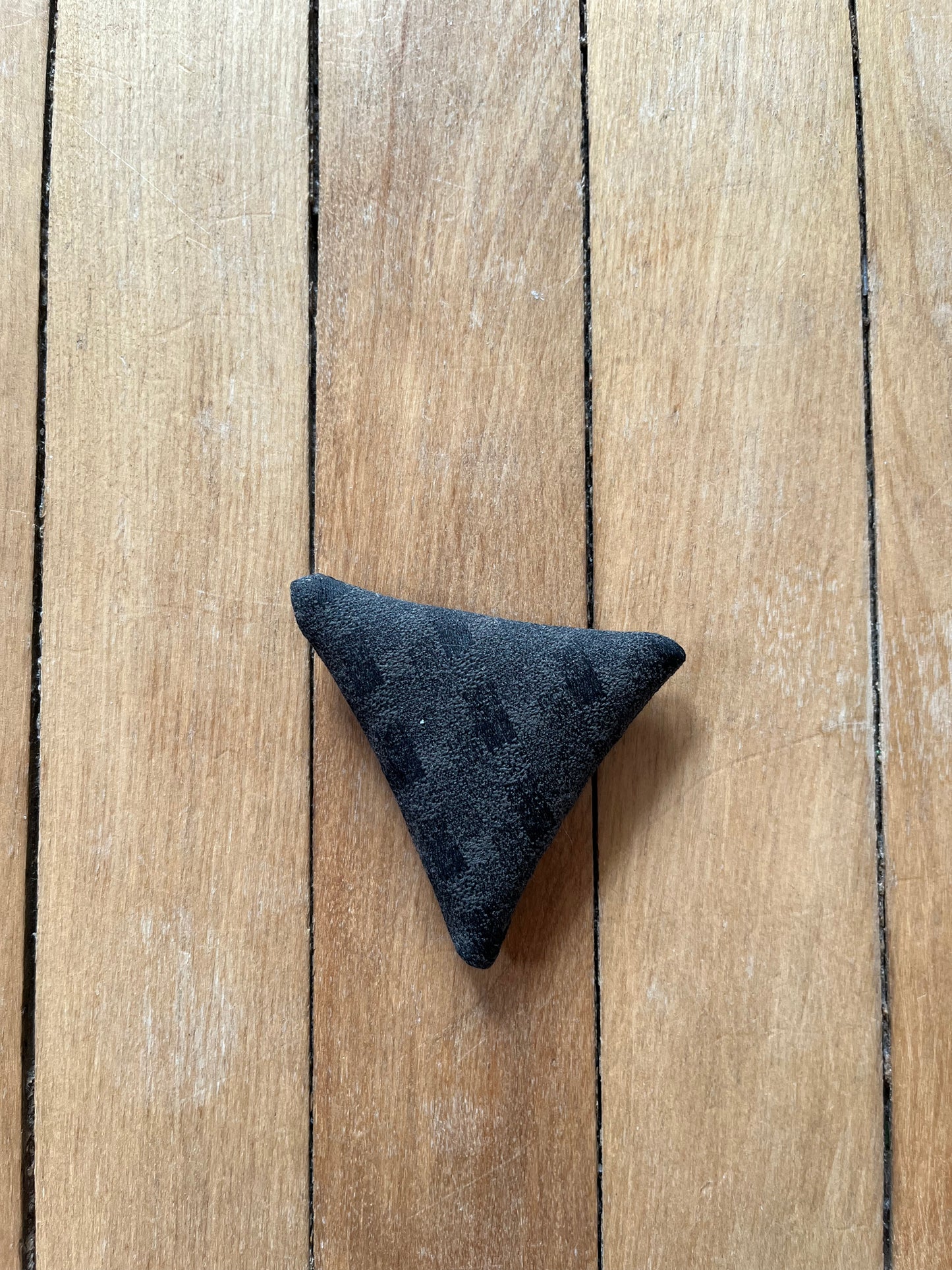 black checkered triangle catnip toy